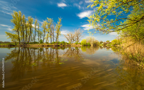 Raba backwater in spring, Gyirmot, Gyor, Hungary. Long exposure shot.