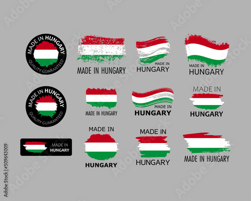 Set of stickers. Made in Hungary. Brush strokes shaped with Hungarian flag. Factory, manufacturing and production country concept. Design element for label and packaging. Vector colorful illustration.