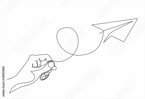 Hand launches into the sky airplane  isolated on white background. continuous line illustration. one line vector. concept of traveling, start up.
