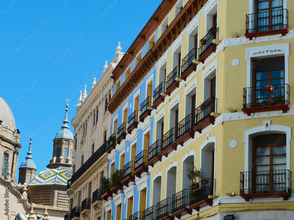 Colourful building facades on main street downtown Zaragoza, Aragon, Spain