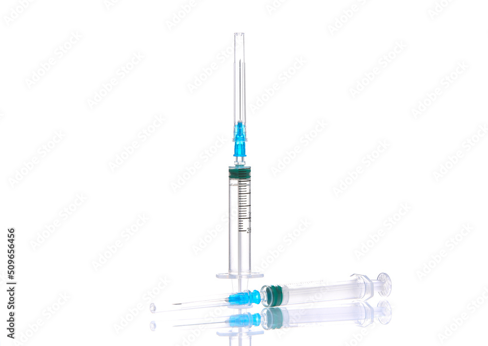 Syringes isolated on white background with reflection Syringes isolated on white background with reflection