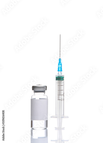 Vaccine bottle with white blank label and syringe isolated on white background with reflection