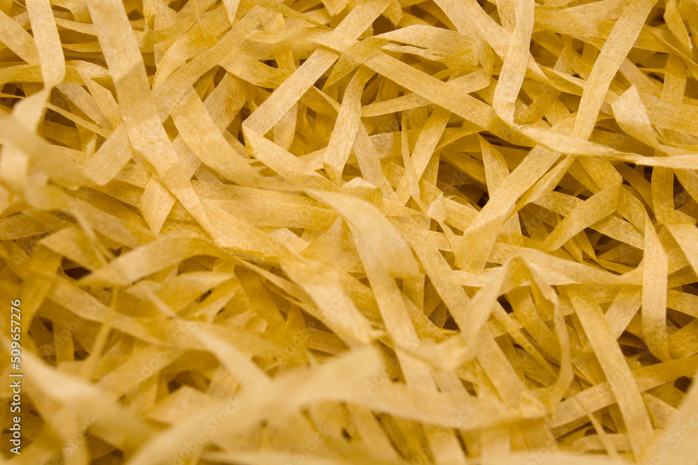 Close up box with decorative straw, filler, shavings, top view, empty giftbox mockup for design, shallow depth of field Close up box with decorative straw, filler, shavings, top view, empty giftbox mockup for design, shallow depth of field