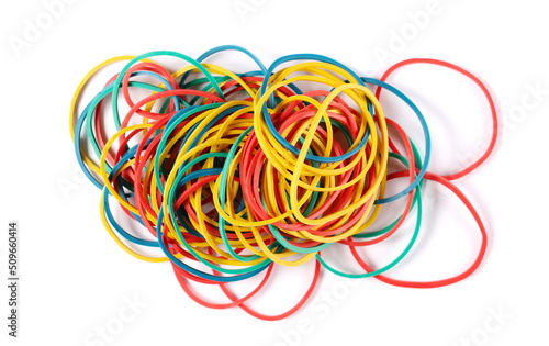 Colorful rubber bands pile isolated on white, top view