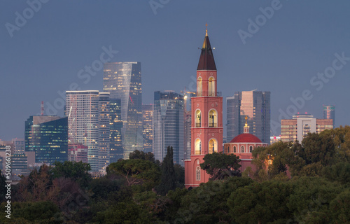 Tel Aviv: Russian Orthodox church and modern skyscrapers at evening