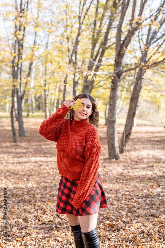 young happy woman walking in autumn forest young happy woman walking in autumn forest