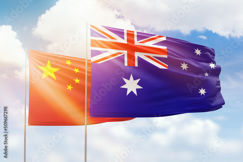 Photography Sunny blue sky and flags of australia and china