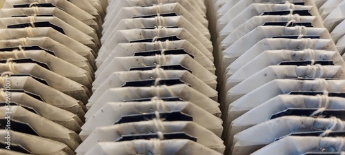 Rows of tea bags close up.