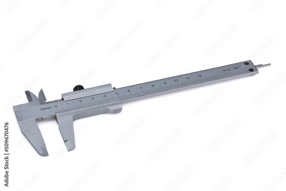 Caliper on a white background. The concept of accurate measurements. Caliper on a white background. The concept of accurate measurements.
