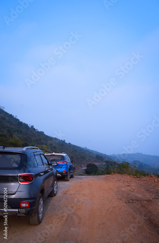 car on the road to a village © Upasana