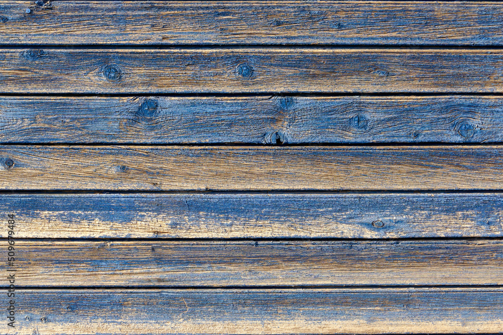 Wooden planks background with aged blue paint. Wooden planks background with aged blue paint.