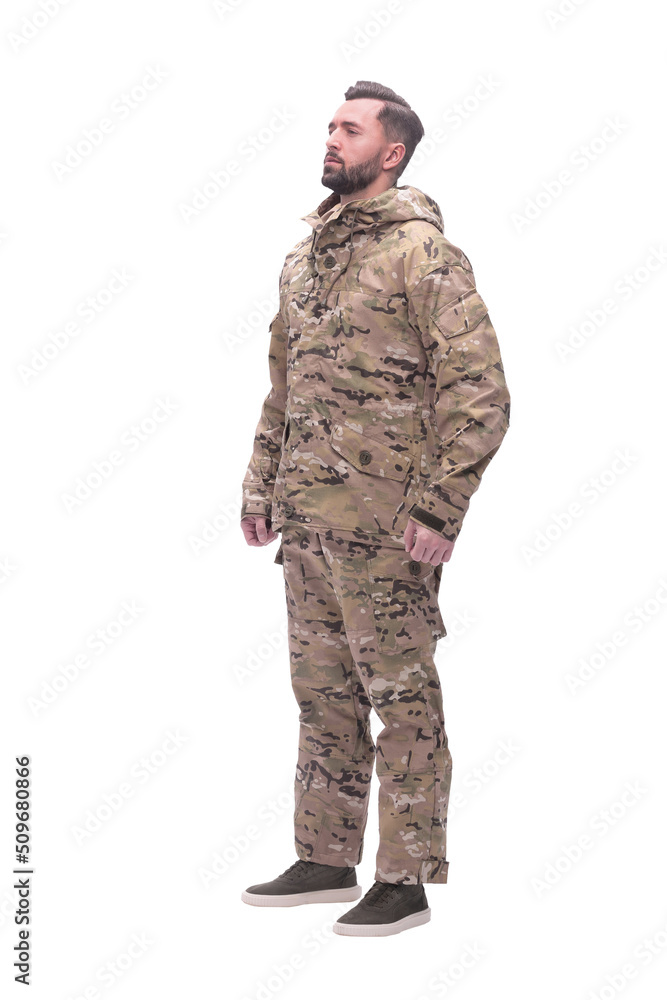 in full growth. a man in autumn camouflage . isolated on white in full growth. a man in autumn camouflage . isolated on white