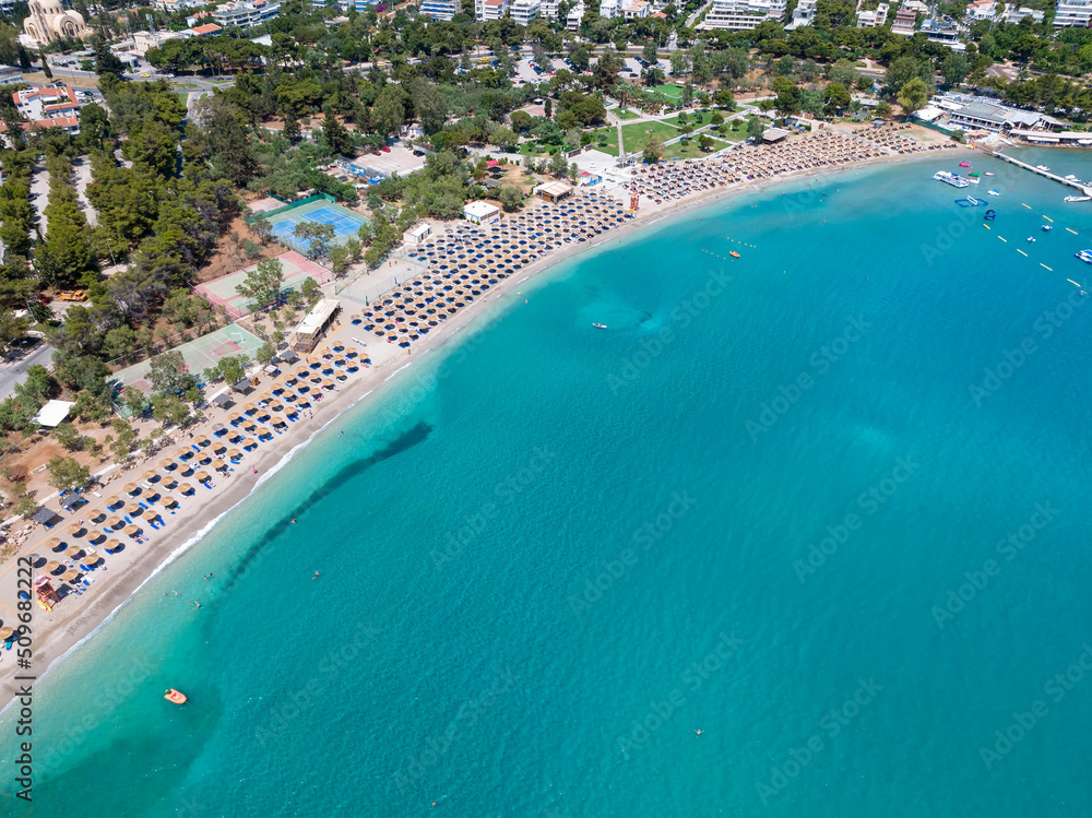 Aerial view of the clear, emerald sea at Vouliagmeni Beach, south Athens suburb, Greece, during summer time