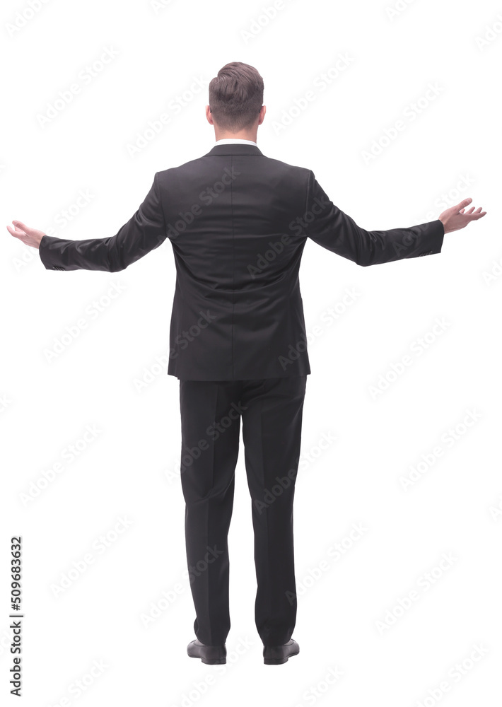 rear view . friendly businessman standing in front of blank white screen rear view . friendly businessman standing in front of blank white screen