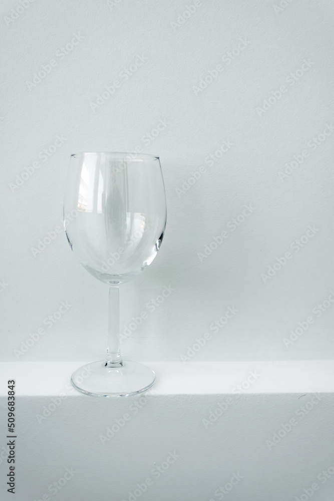 empty champagne wine glass on isolated white background. mockup for drinks and juices. crockery, transparent glass for juice cocktails