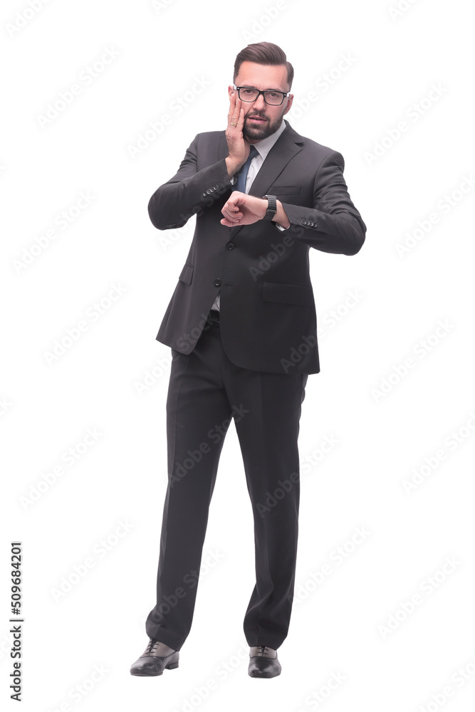 Obraz premium full length . Executive businessman looking at his wristwatch