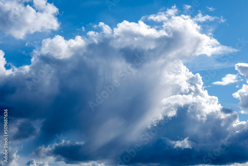 Fototapeta Naklejka Na Ścianę i Meble -  Cumulus and wispy clouds together before a rain storm
