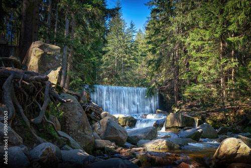 Picturesque waterfall on Lomnica River. Karpacz, Poland.