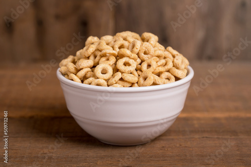 Cereal on Wood Surface in White Bowl