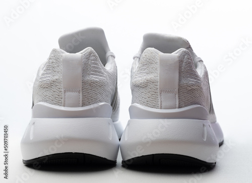 Back view of sport white shoes