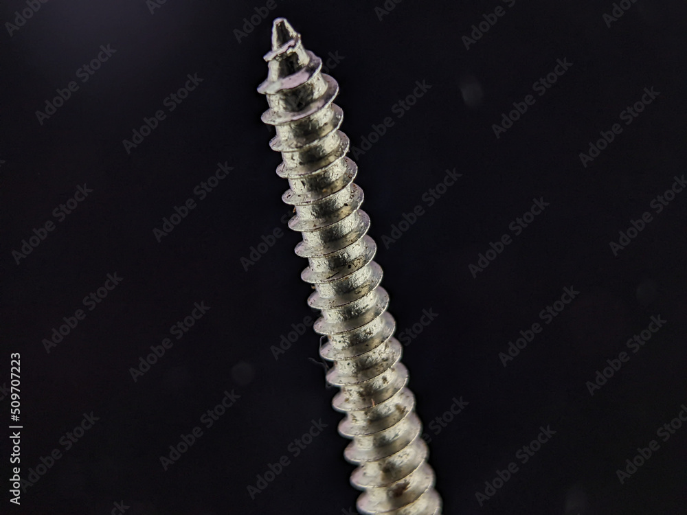 Closeup Deck Screws on a black background Closeup Deck Screws on a black background
