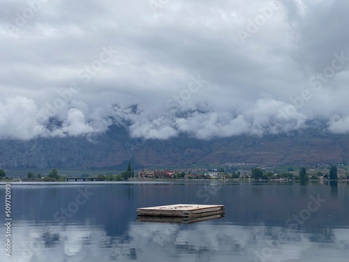Dock in the middle of Osoyoos lake during a cloudy/stormy day (landscape)