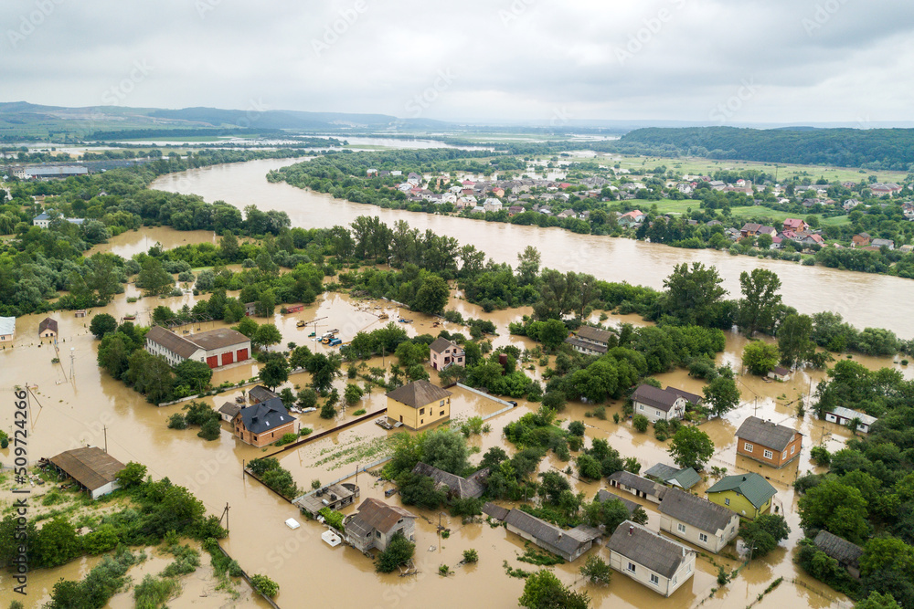 Aerial view of flooded houses with dirty water of Dnister river in Halych town, western Ukraine