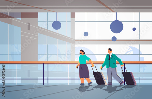 passengers couple with baggage businesspeople standing with luggage traveling concept airport terminal interior