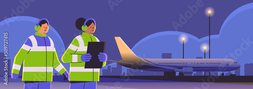 aviation marshallers supervisors near aircraft air traffic controllers airline workers in signal vests professional airport staff