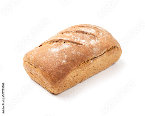 Lush loaf of rye bread isolated on a white background. Homemade baking.
