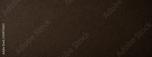 レザー調の質感のある褐色の紙の背景テクスチャー