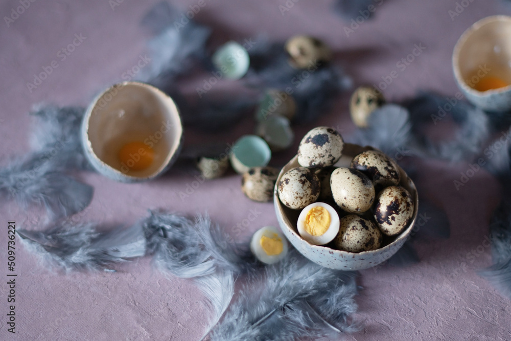 quail eggs in ceramic vases, gray feathers on the table, easter still life, quail eggs in ceramic vases, gray feathers on the table, easter still life,