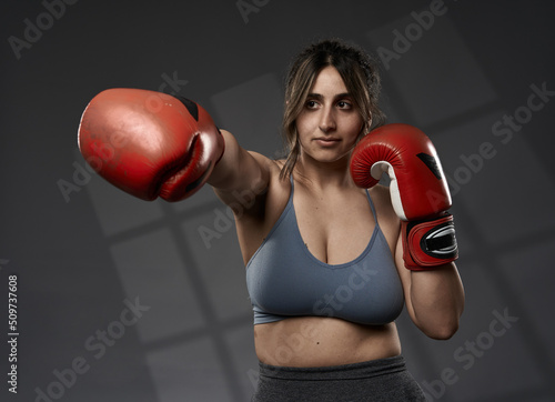 Size plus indian woman training boxing