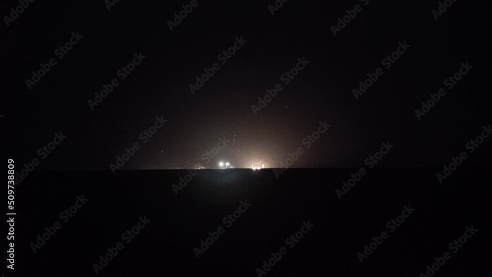 agricultural machinery works night in field agricultural machinery works night in field