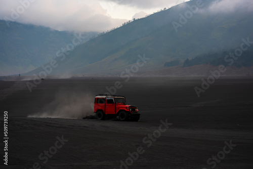 Tourists 4x4 Jeep for tourist rent at Mount Bromo,The active Mount Bromo is one of the most visited tourist attractions in East Java , Indonesia. © tonjung