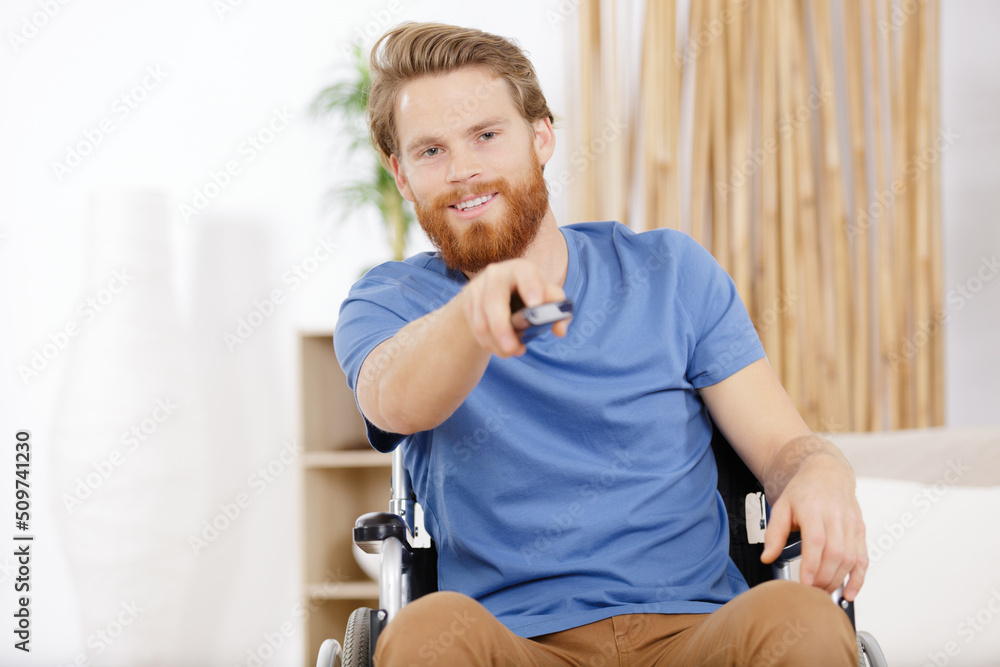 disabled man watching sports on tv disabled man watching sports on tv
