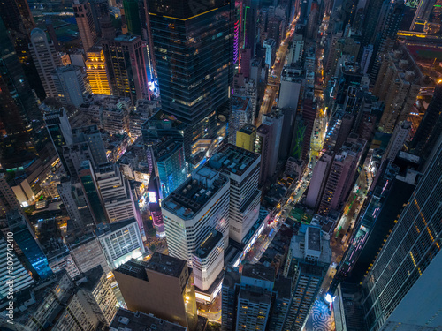 Drone fly over Hong Kong city at night