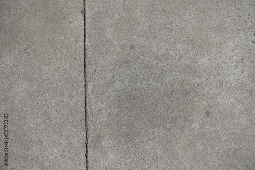 simple gray concrete slab with one vertical joint