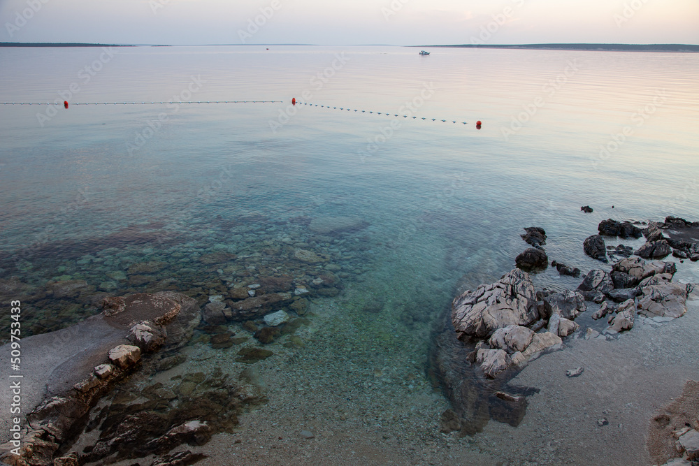 Adriatic sea beach at the sunset