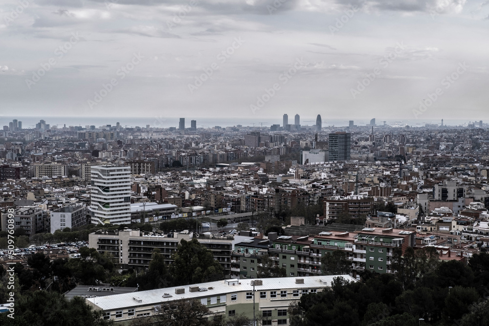 aerial view of the city of Barcelona on a cloudy day