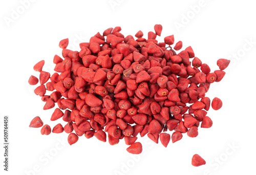 Annatto seeds, isolated on a white background. Achiote seeds, bixa orellana. Natural dye for cooking and food. Close-up. Top view. photo
