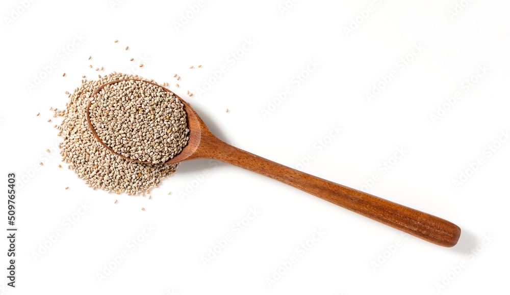 Wooden spoon and white chia seeds placed on white background. Wooden spoon and white chia seeds placed on white background.