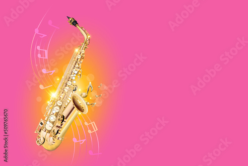 Golden saxophone on a pink background with glitter