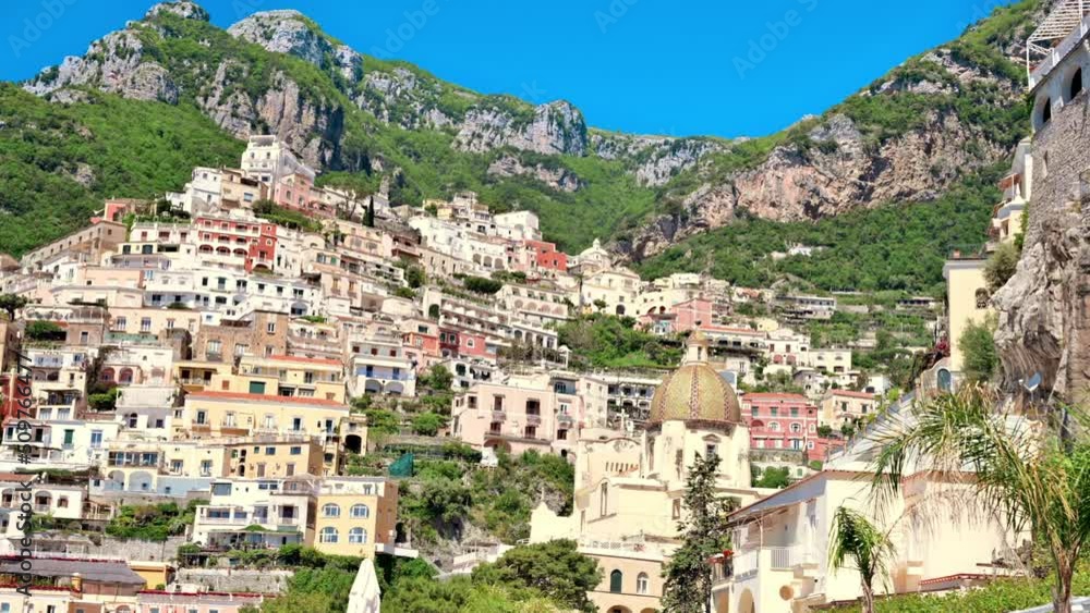 Street scape of Positano, located on the Tyrrhenian sea coast, Italy. Rows of residential buildings, greenery Street scape of Positano, located on the Tyrrhenian sea coast, Italy. Rows of residential buildings, greenery