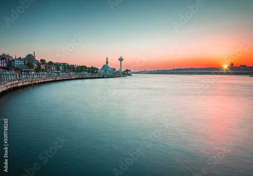 Fotografering sunset over the Bosphorus strait in Istanbul city