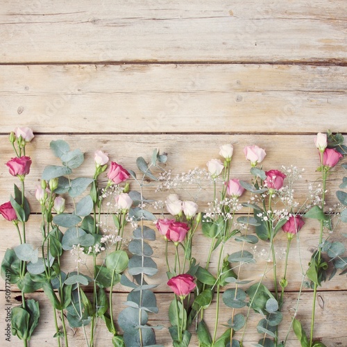 pink flowers with eucalyptu...