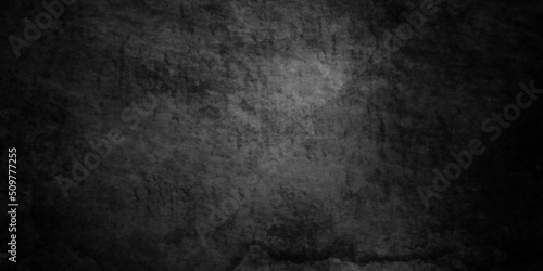 Dark grunge background Black stone concrete texture background anthracite panorama. Panorama dark grey black slate backdrop background or texture. © MdLothfor