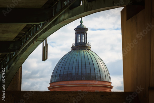 Iconic La Grave dome seen through out Saint-Pierre Bridge in Toulouse city France