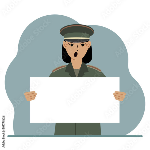 A military man in uniform holds a white sheet of paper in his hands. Concept for advertising, poster, banner.