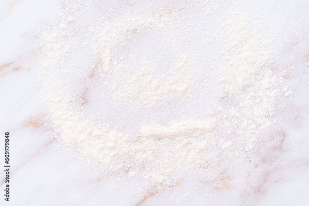 Flour on a marble surface Flour on a marble surface